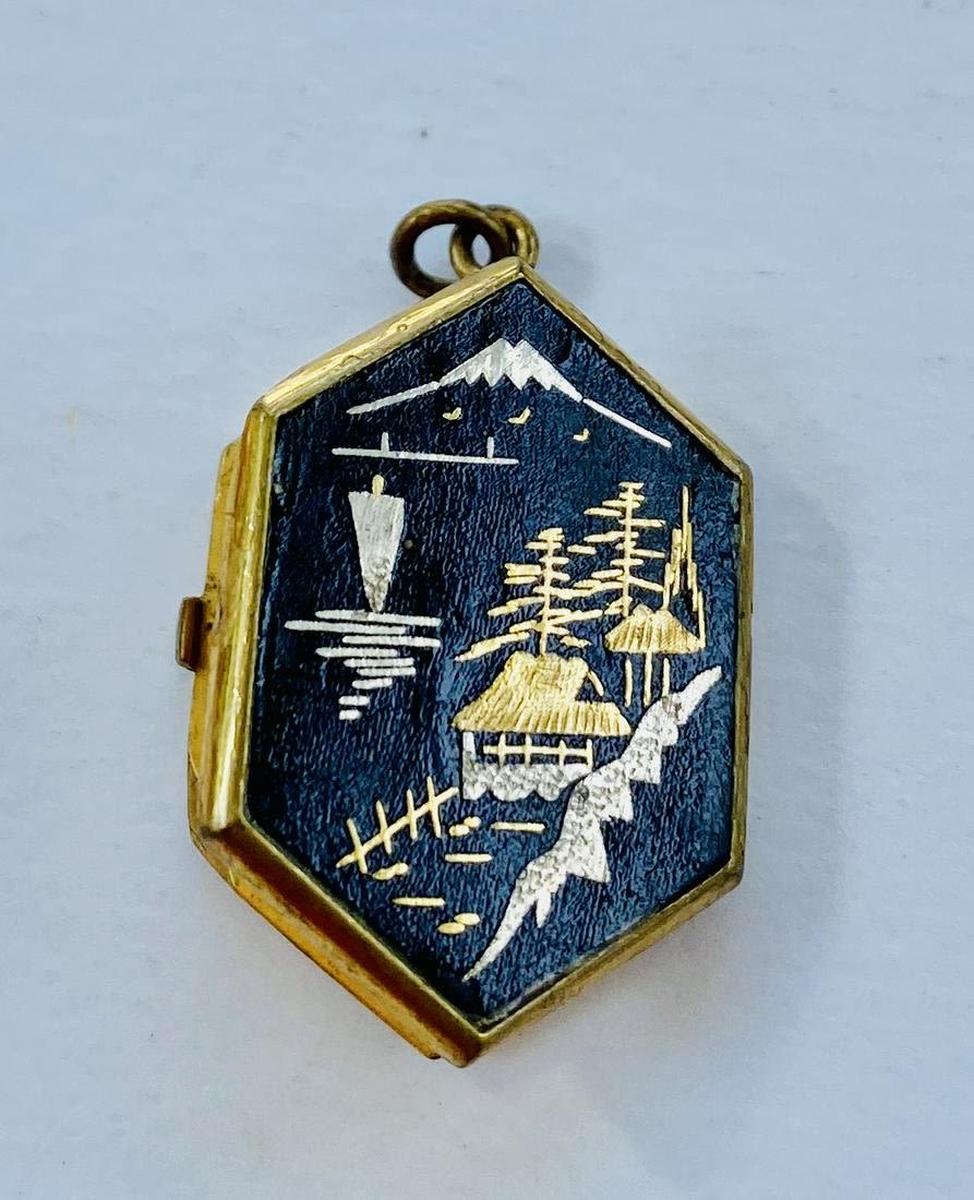 Lot 245: Japanese locket Damascene black/ scene