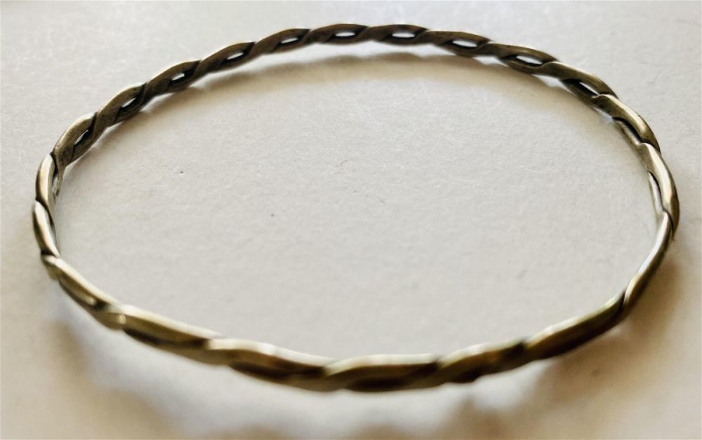 Lot 248: Bangle bracelet twitsed sterling design