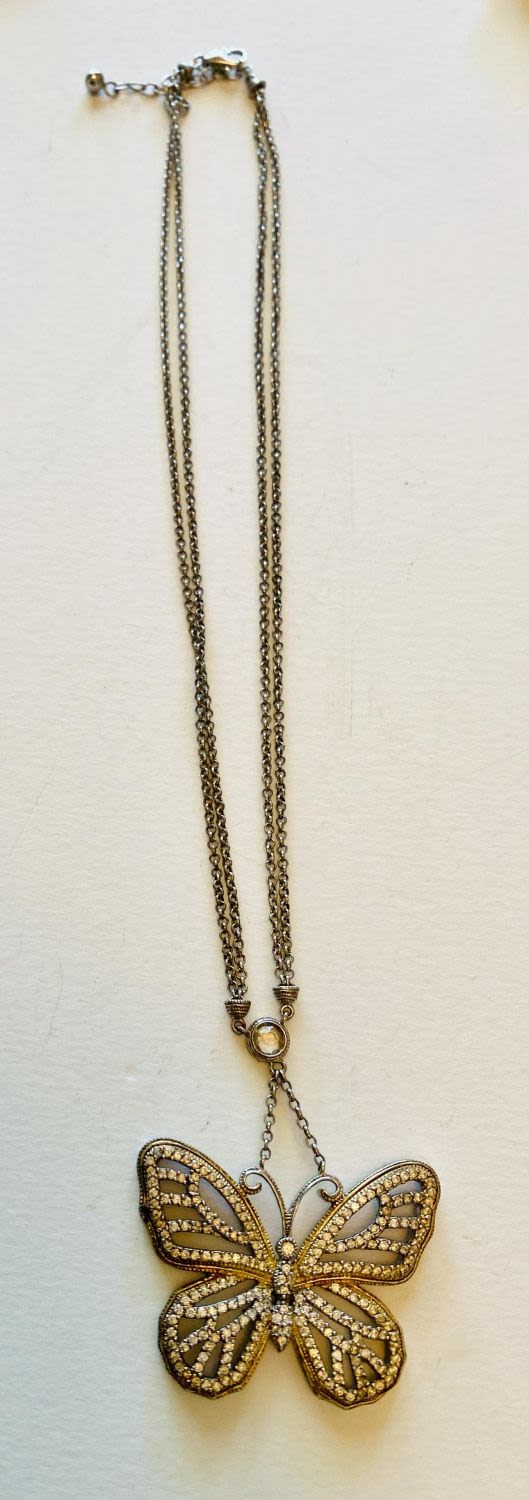 Lot 299: Butterfly sterling chain pendant
