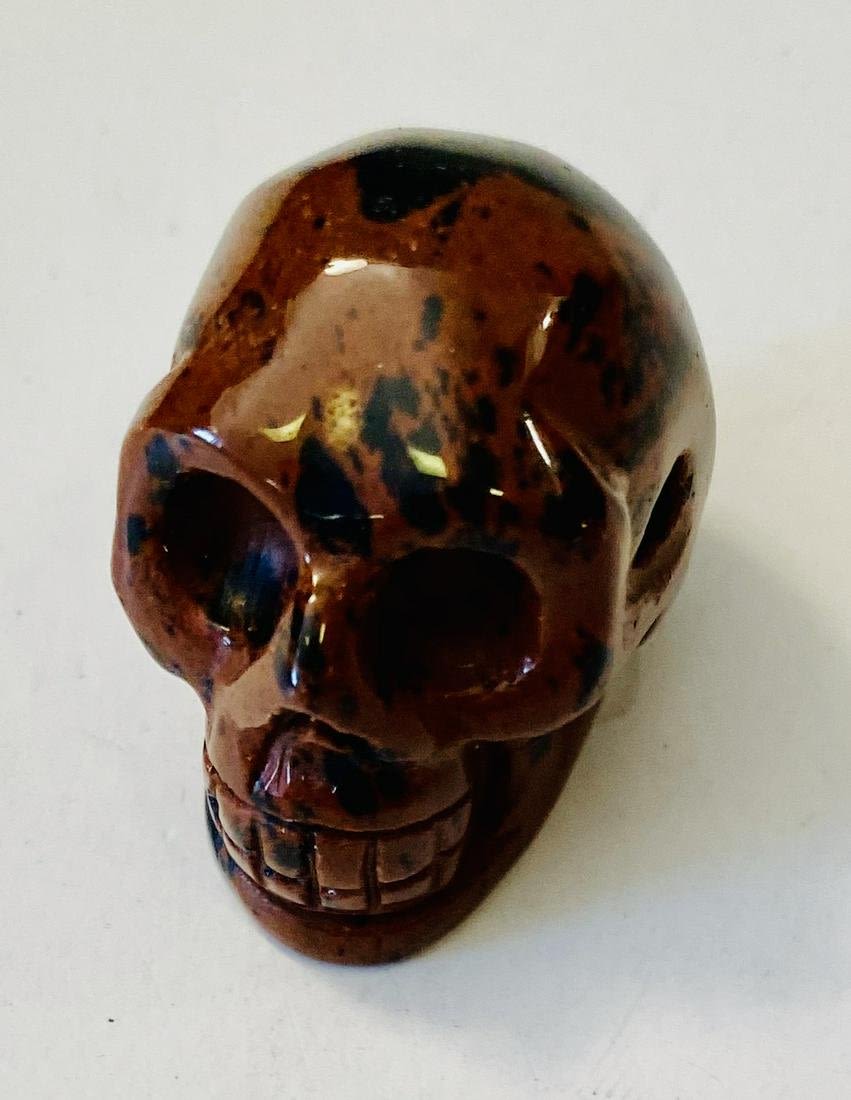 Lot 316: Skull headstone carved polished specimen