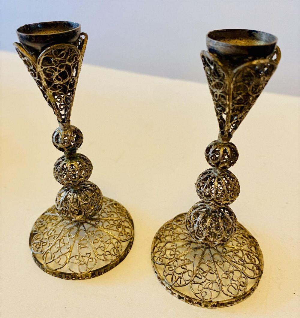 Lot 331: Sterling pair filigree candlesticks vintage
