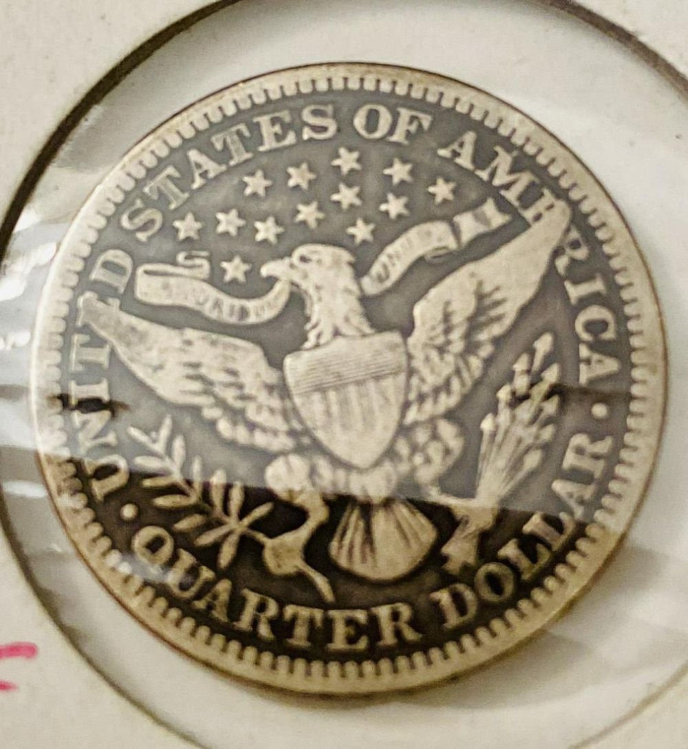 Lot 354: Barber silver quarter 1914