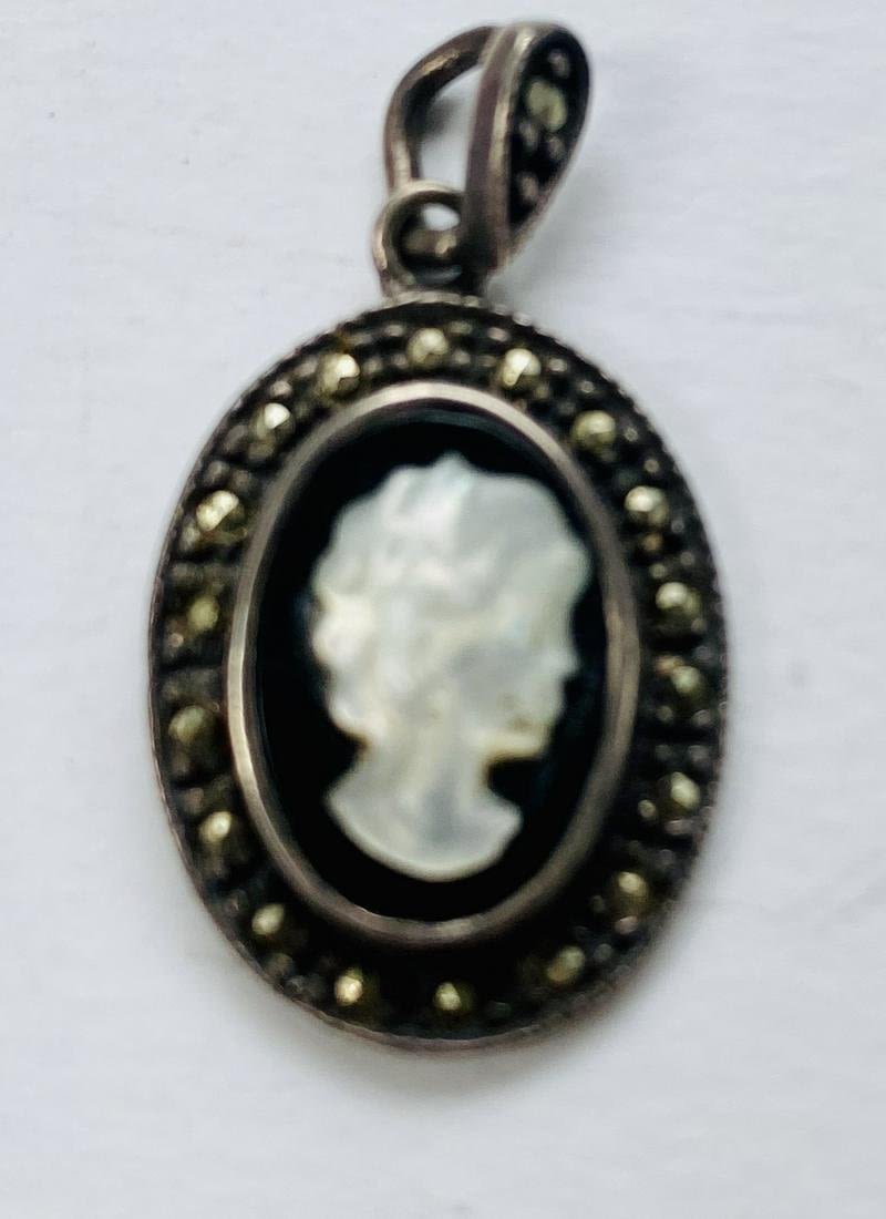 Lot 382: Cameo marcasite vintage sterling pendant