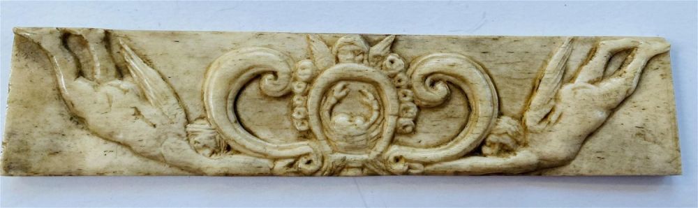 Lot 387: Bone carved vintage plaque