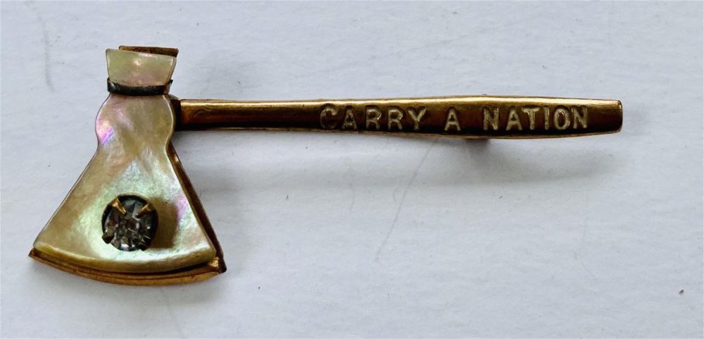 Lot 392: Carry A Nation axe Mother of pearl pin