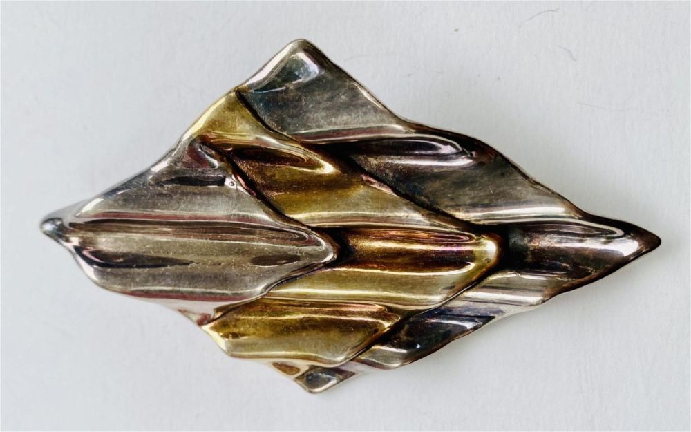 Lot 408: Sterling gold/silver large pin marked on back