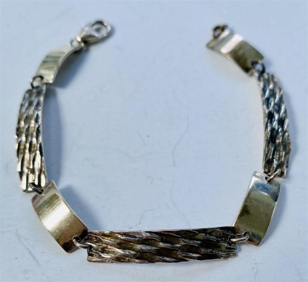 Lot 413: Sterling bracelet - bars linked marked
