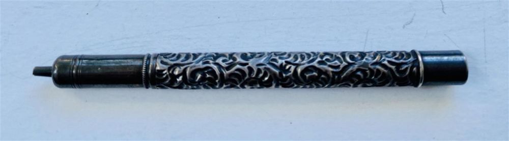 Lot 440: Silver vintage pencil fancy engraving