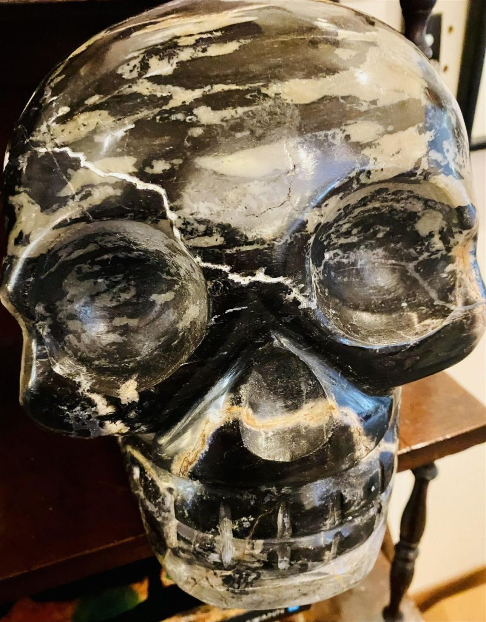 Lot 473: Petrified wood skull life size