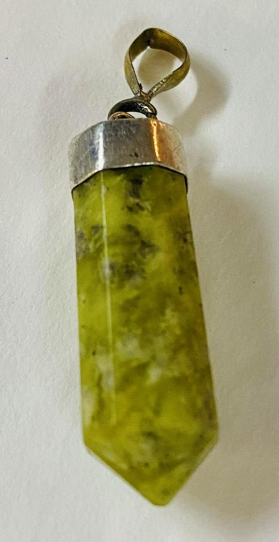 Lot 84: Jade crystal  point pendant