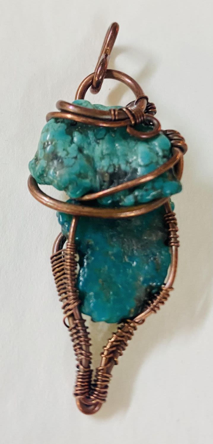 Lot 85: Turquoise  wire wrapped pendant