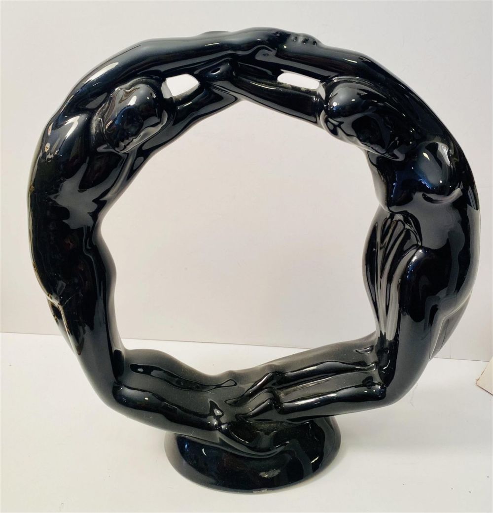 Lot 362: Circle of love Pottery deco statue