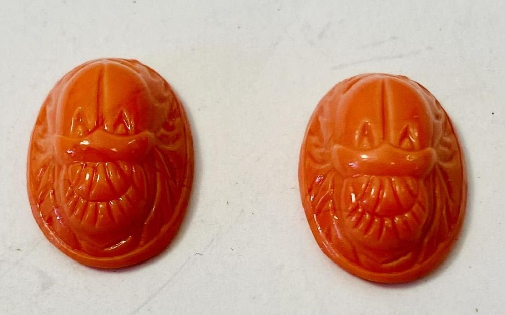 Lot 503: Scarabs glass coral color