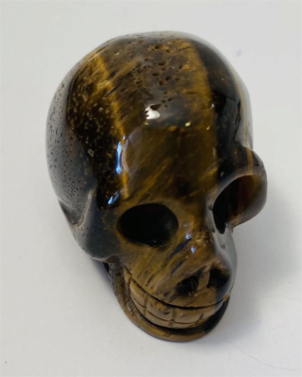 Lot 505: Skull carved tiger eye custom