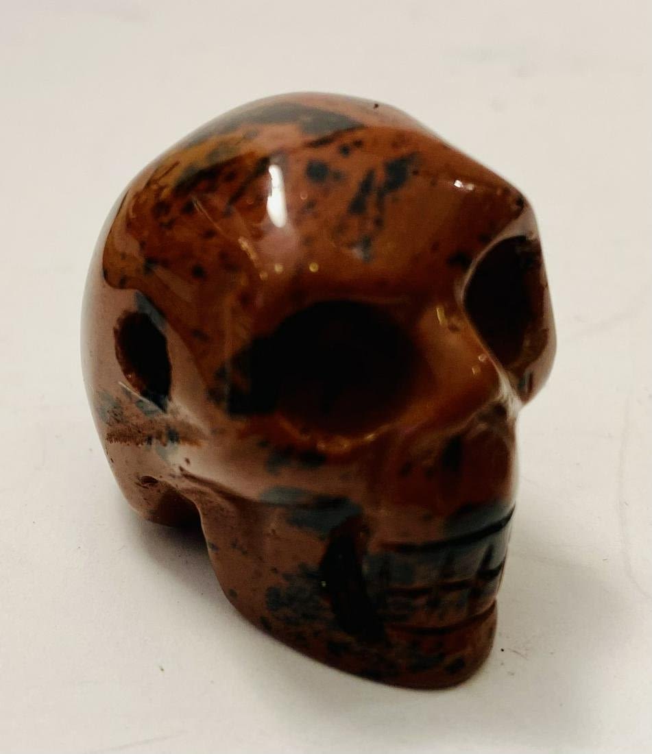 Lot 241: Skull carved from jasper stone drilled
