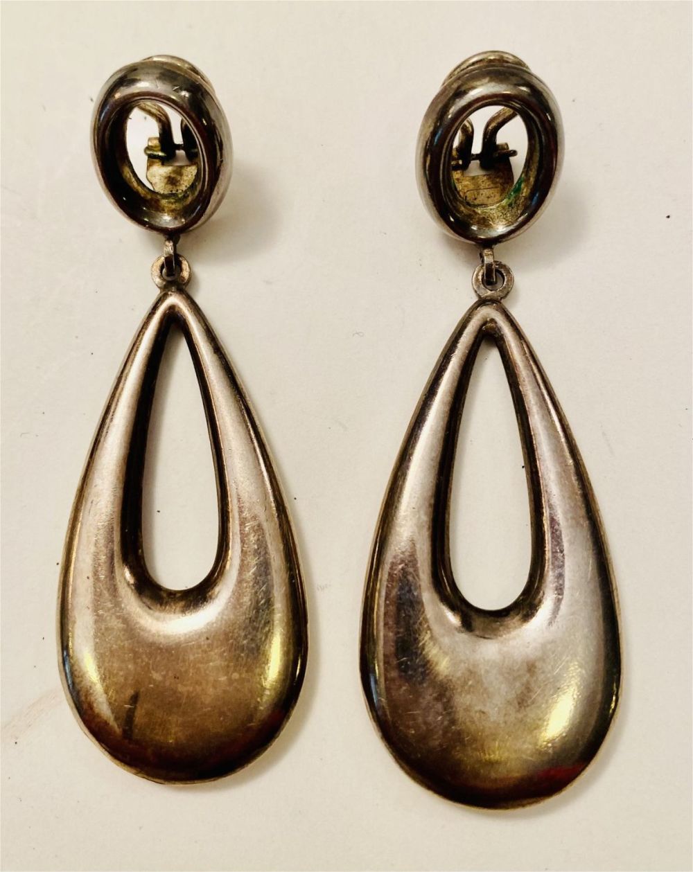 Lot 242: Sterling long oval earrings