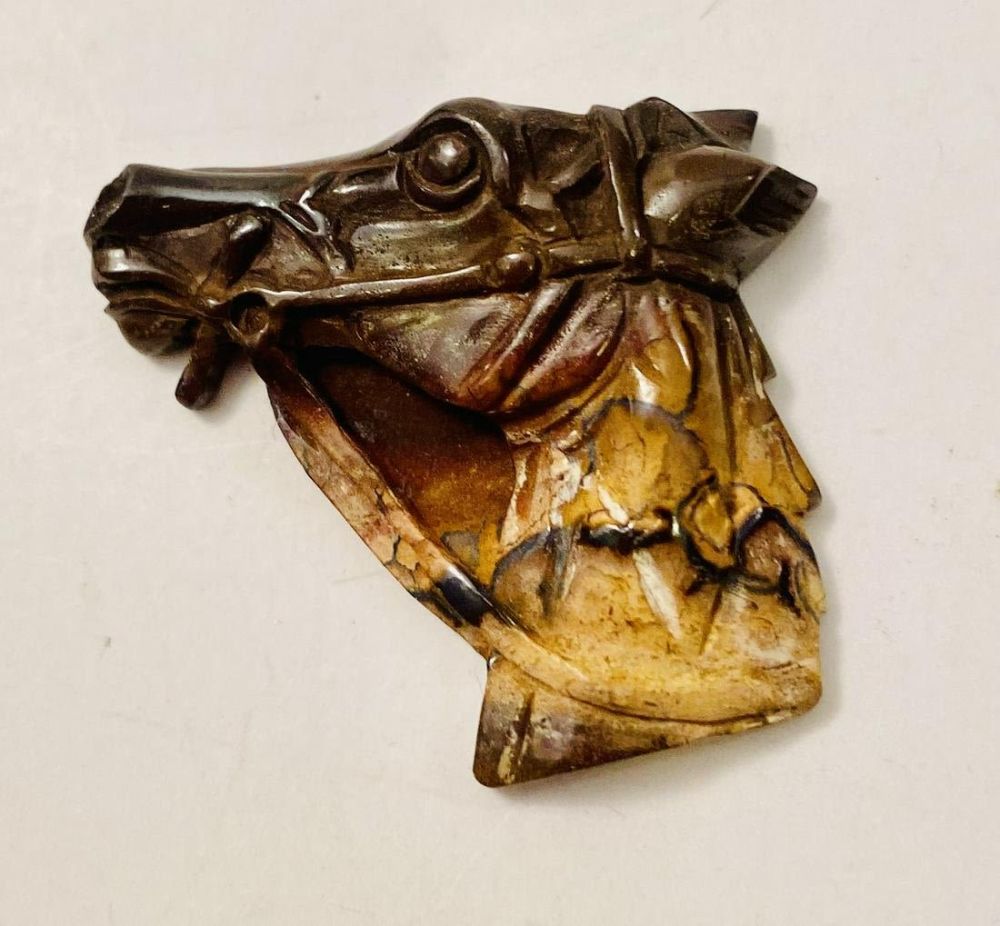 Lot 258: Horse opal carved head