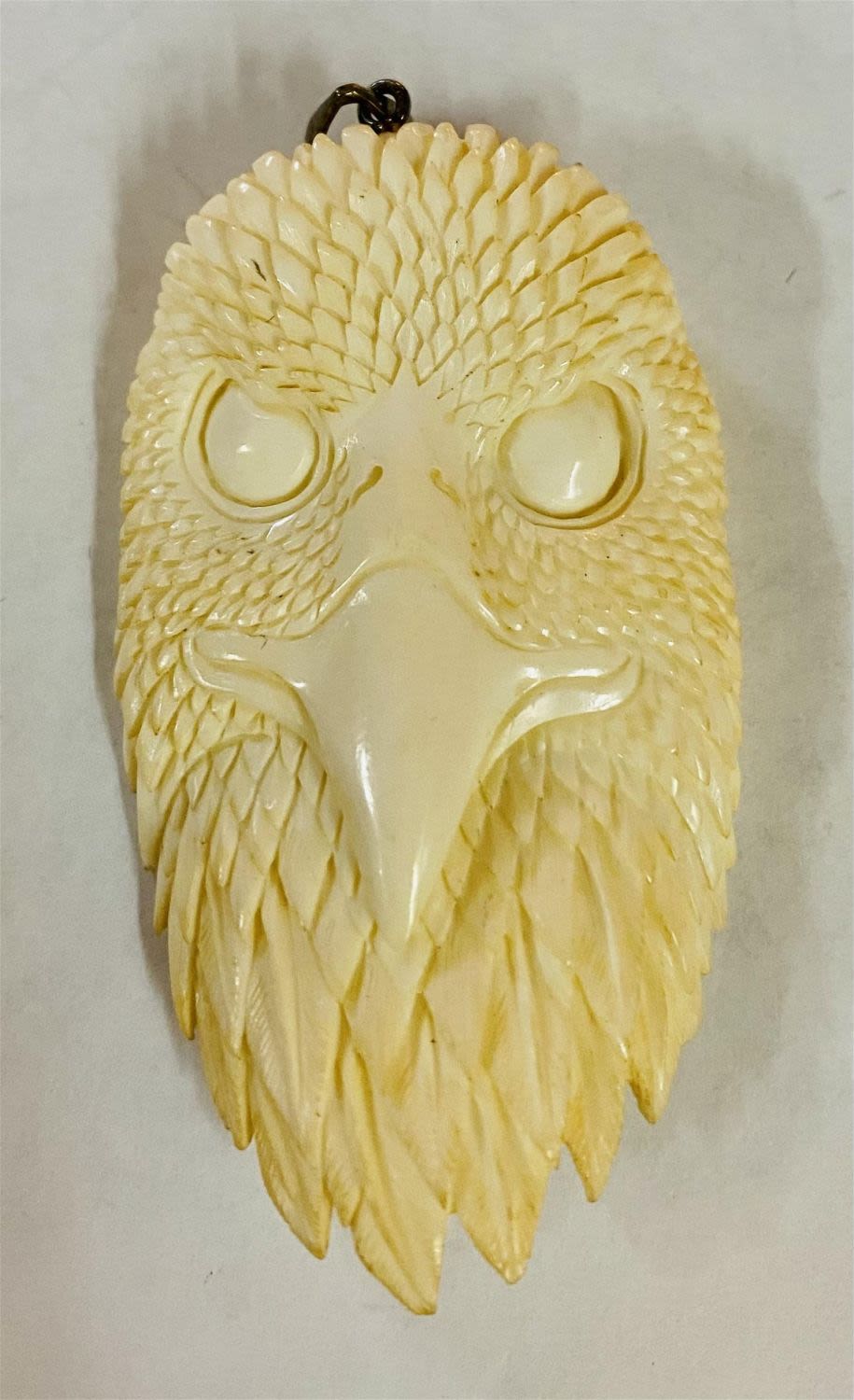 Lot 288: Eagle carved bone pendant