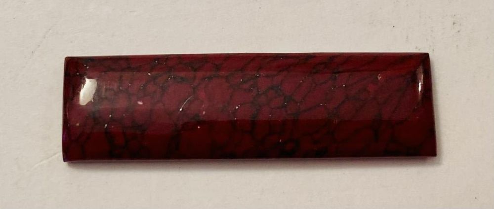 Lot 56: Dinosaur bone polished cut gemstone