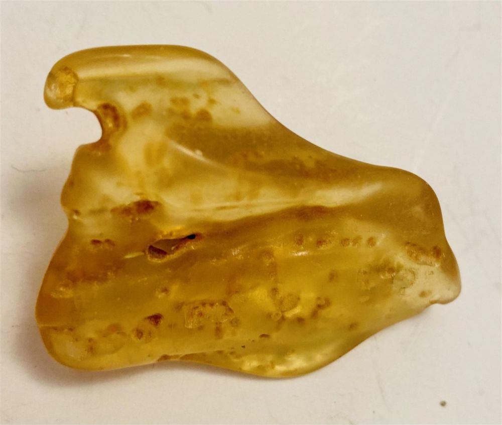 Lot 71: Copal amber color specimen gold honey color