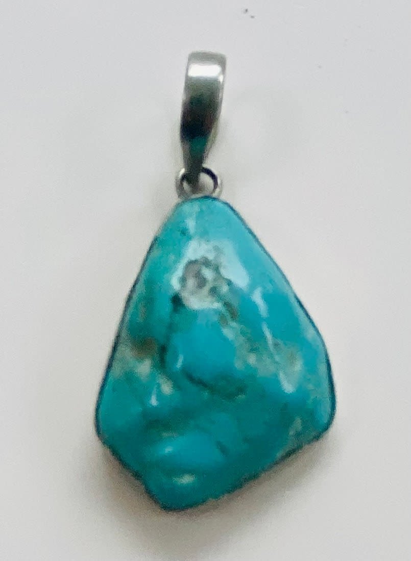 Lot 104: Turquoise sterling pendant nugget