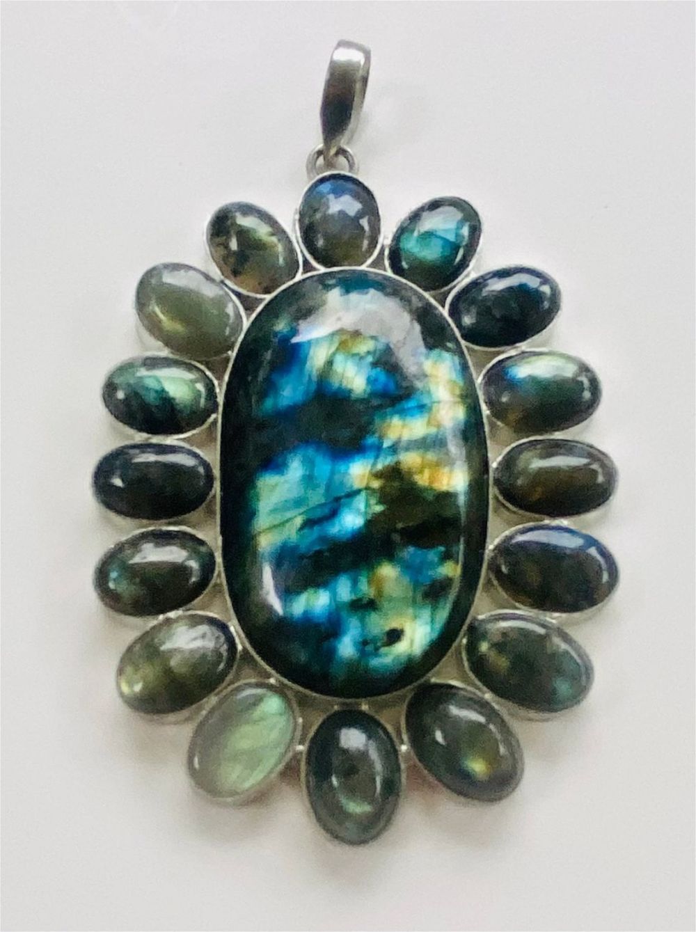 Lot 111: Sterling labradorite cabochon pendant massive