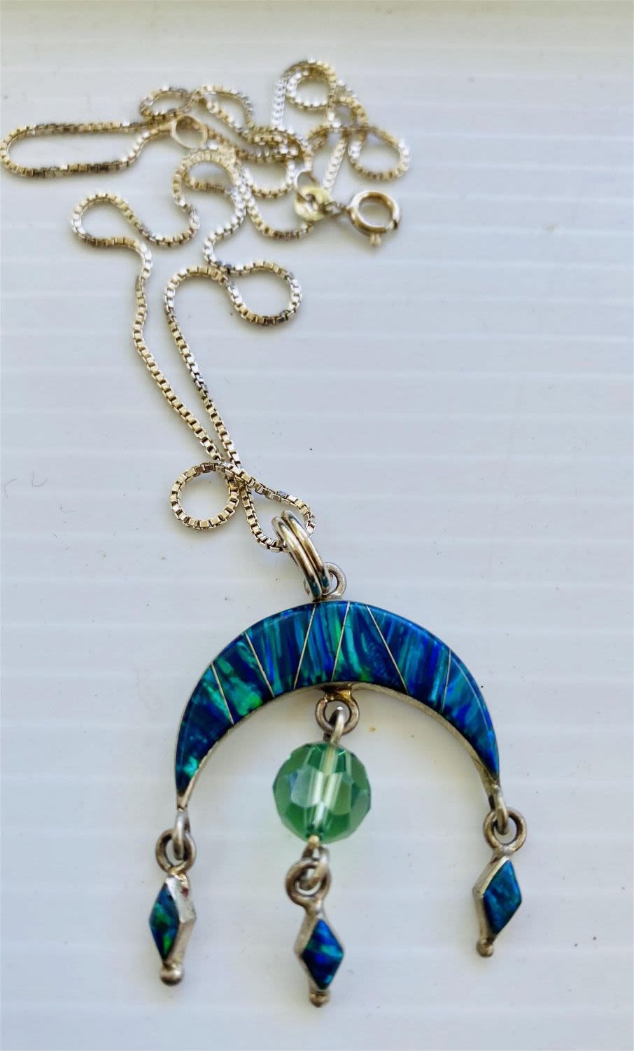 Lot 309: Opal pendant on sterling chain