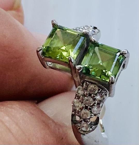 Lot 329: Peridot sterling ring prong set