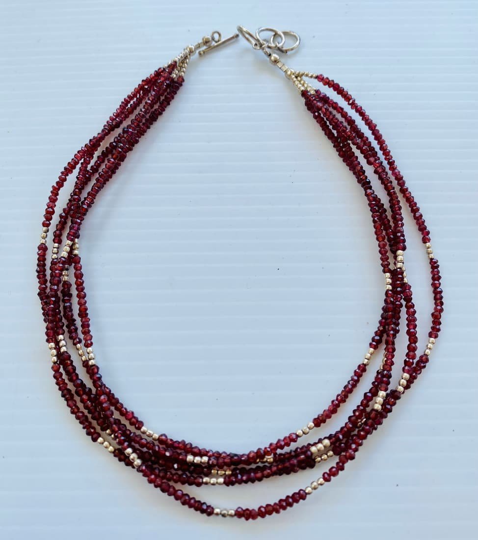 Lot 357: Garnet bead 4 strand necklace
