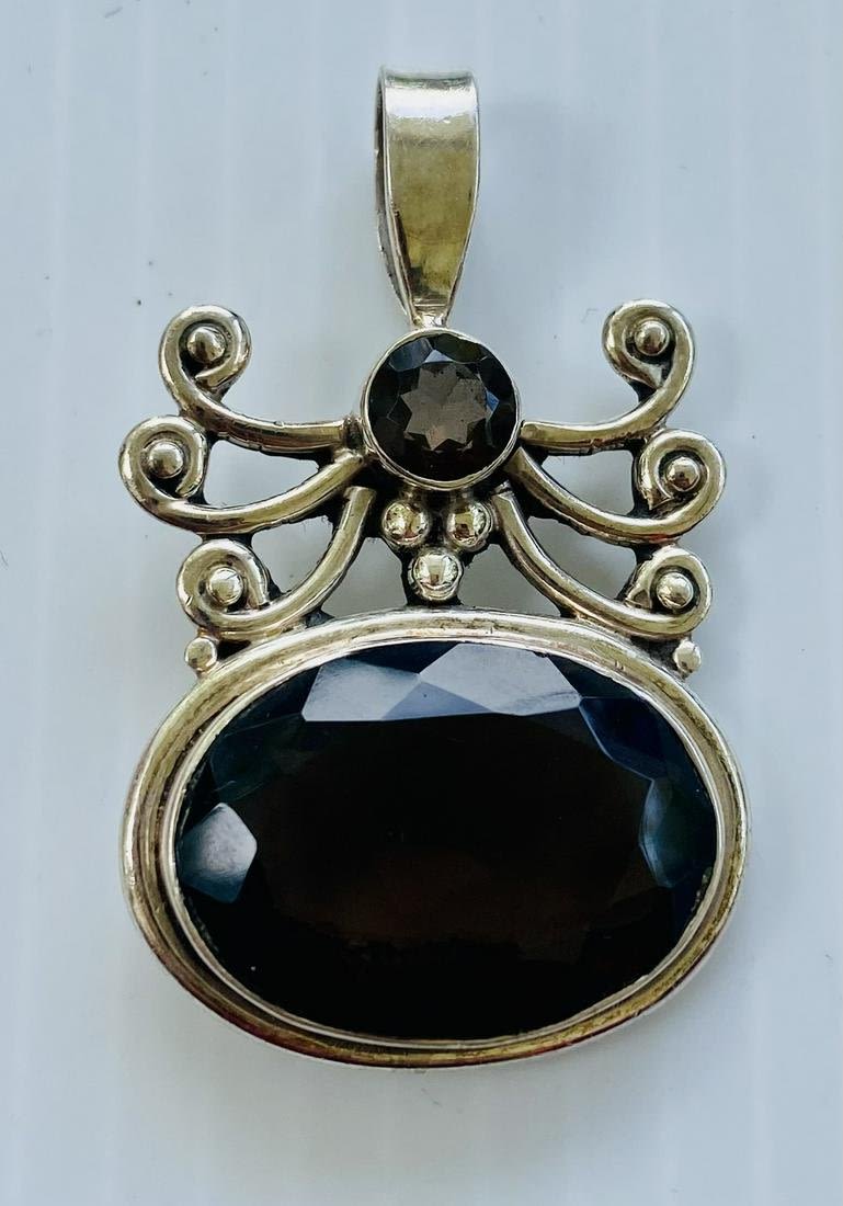 Lot 364: Smoky quartz sterling fancy pendant