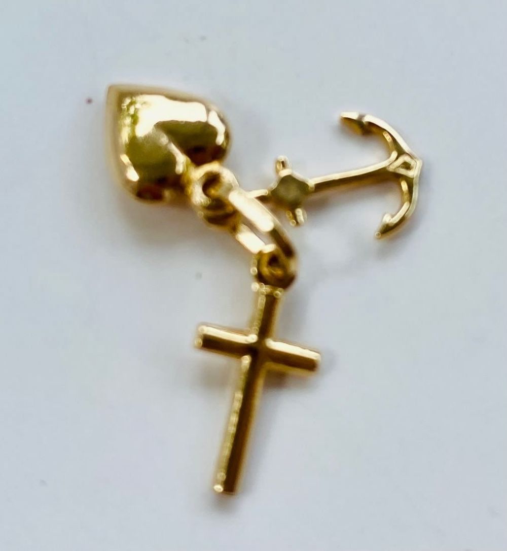 Lot 168: 14k cross, heart and anchor pendant/charm
