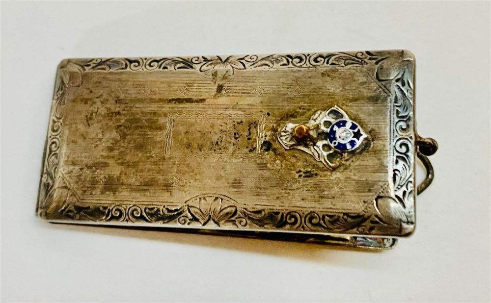 Lot 379: Sterling Elks club stamp holder-1920's