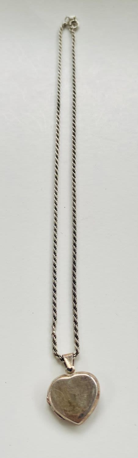 Lot 173: Heart locket on chain/sterling