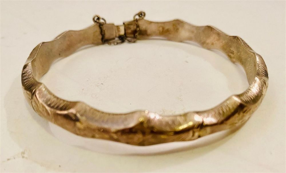 Lot 421: Vintage bangle sterling bracelet etched