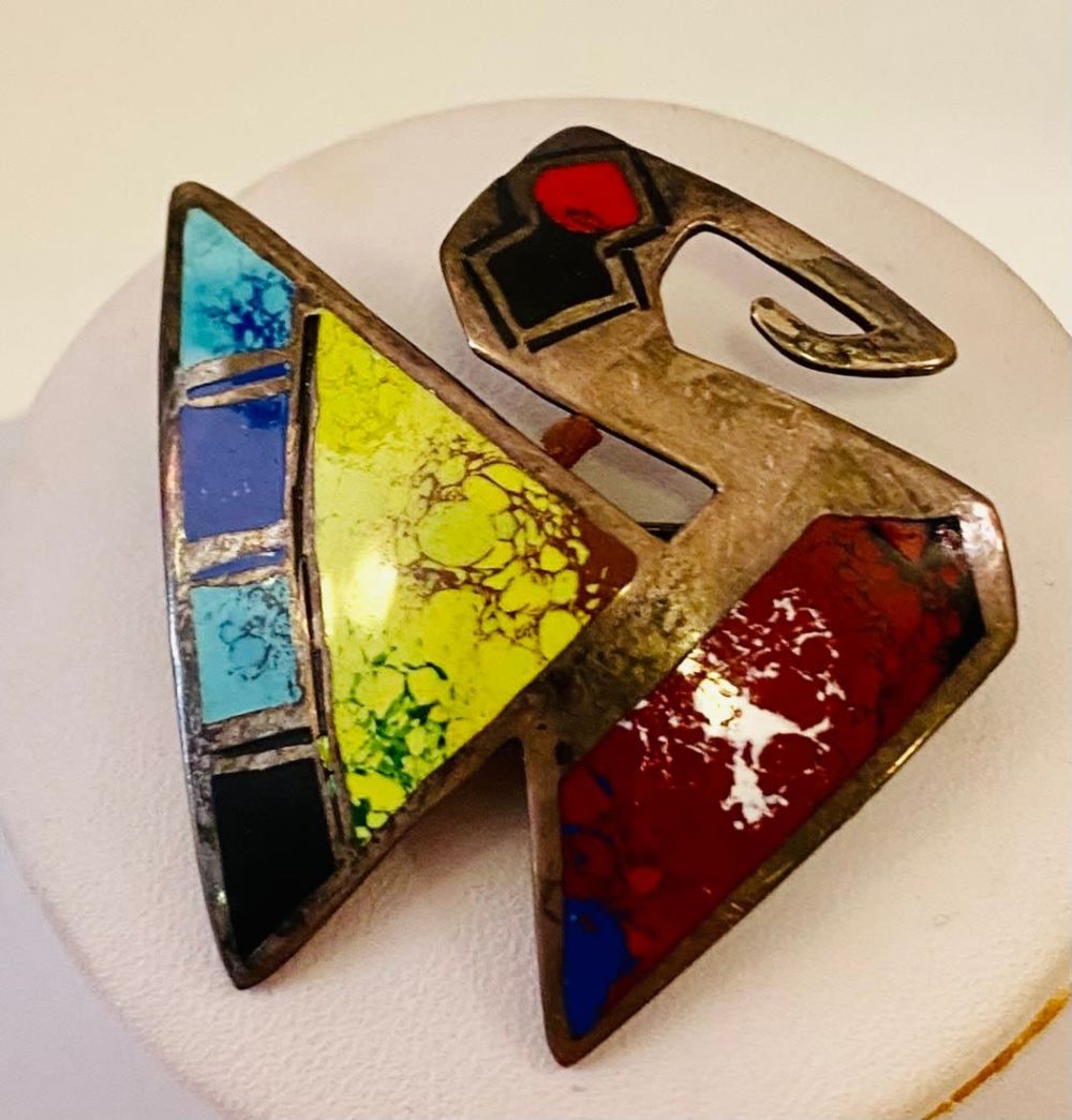 Lot 428: Sterling enamel bird pin/Peru