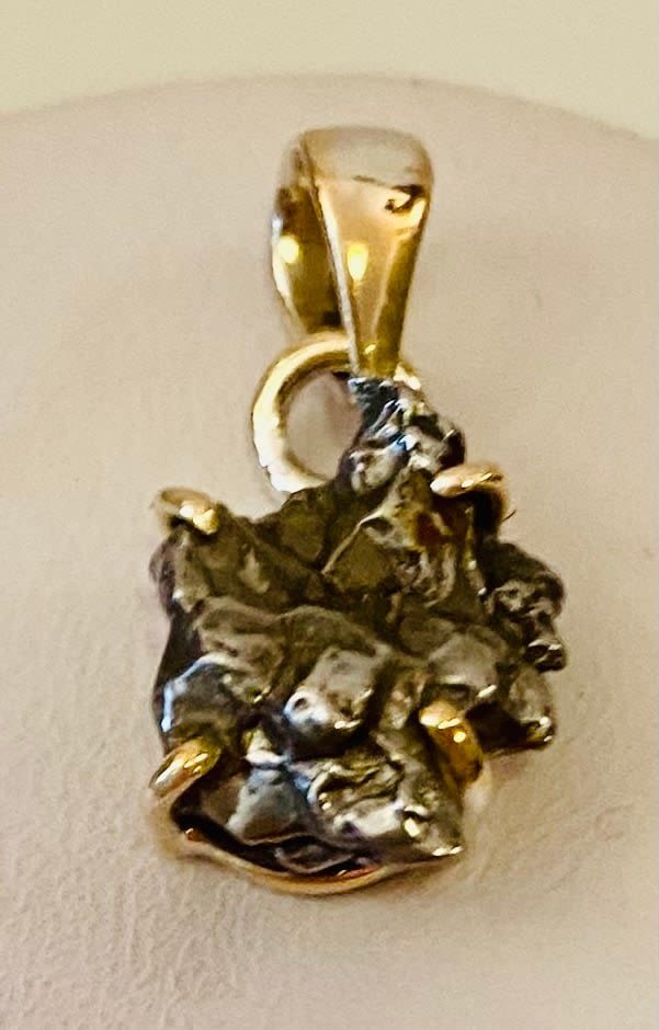 Lot 430: Meteorite sterling pendant