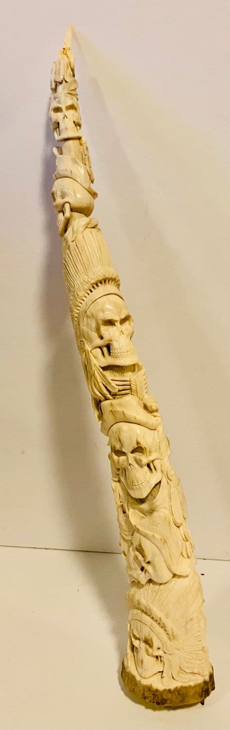 Lot 477: Antler carved skulls detailed custom