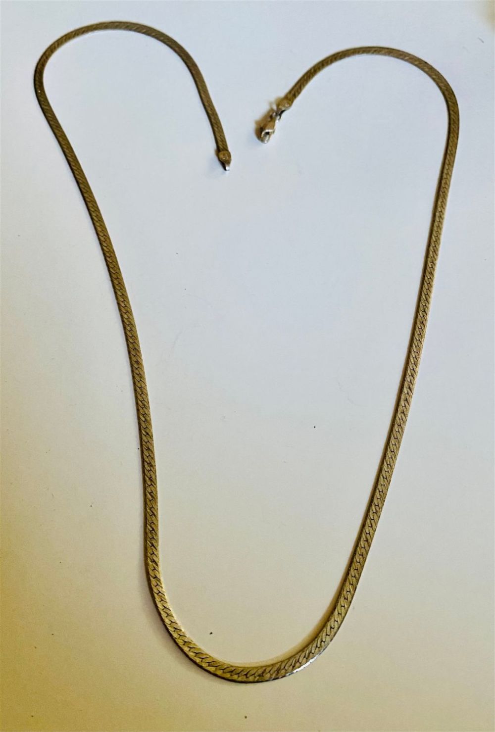 Lot 481: Sterling flat chain about  24 inches