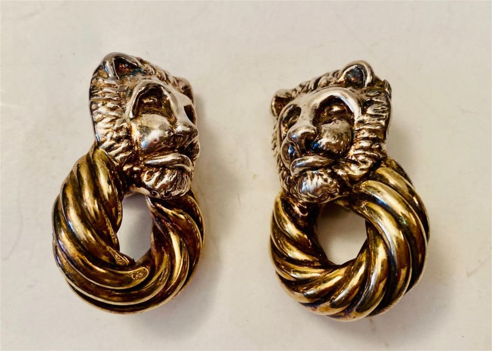 Lot 310: Vintage lion sterling earrings