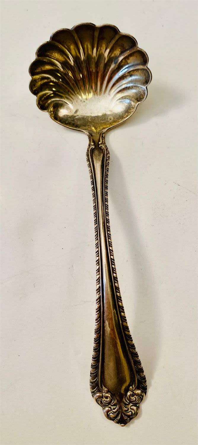 Lot 346: Sterling VIctorian gravy ladle hallmarked