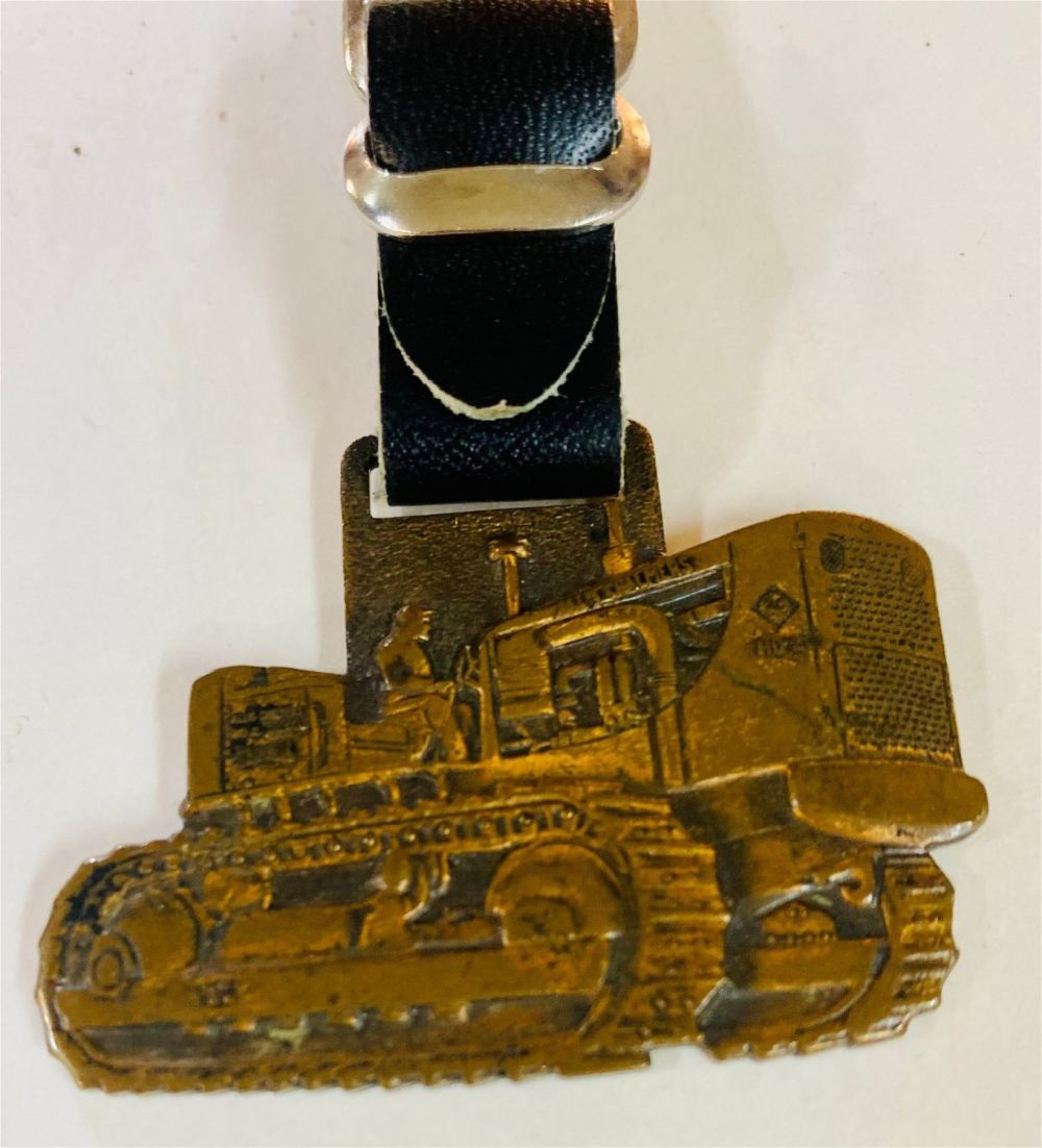 Lot 231: Advertising machine shop grader on/leather strap