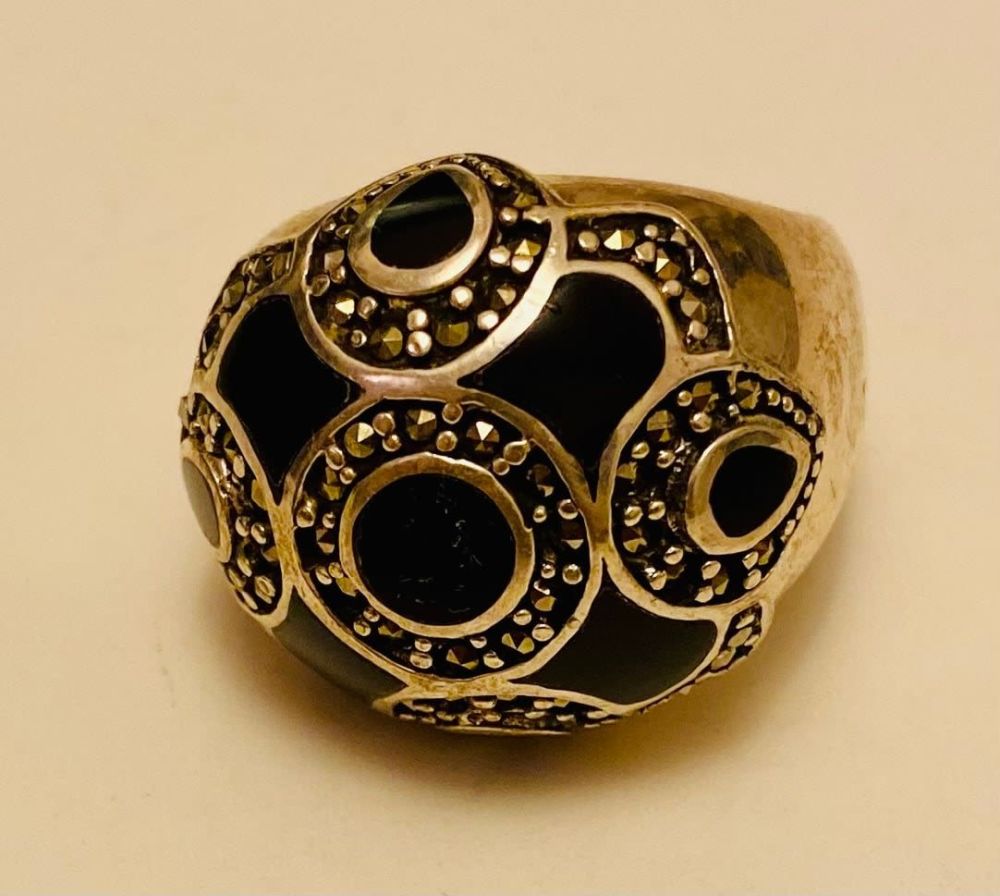 Lot 261: Sterling onyx marcasite ring