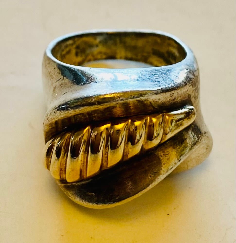 Lot 271: Wide sterling ring marked Mexico