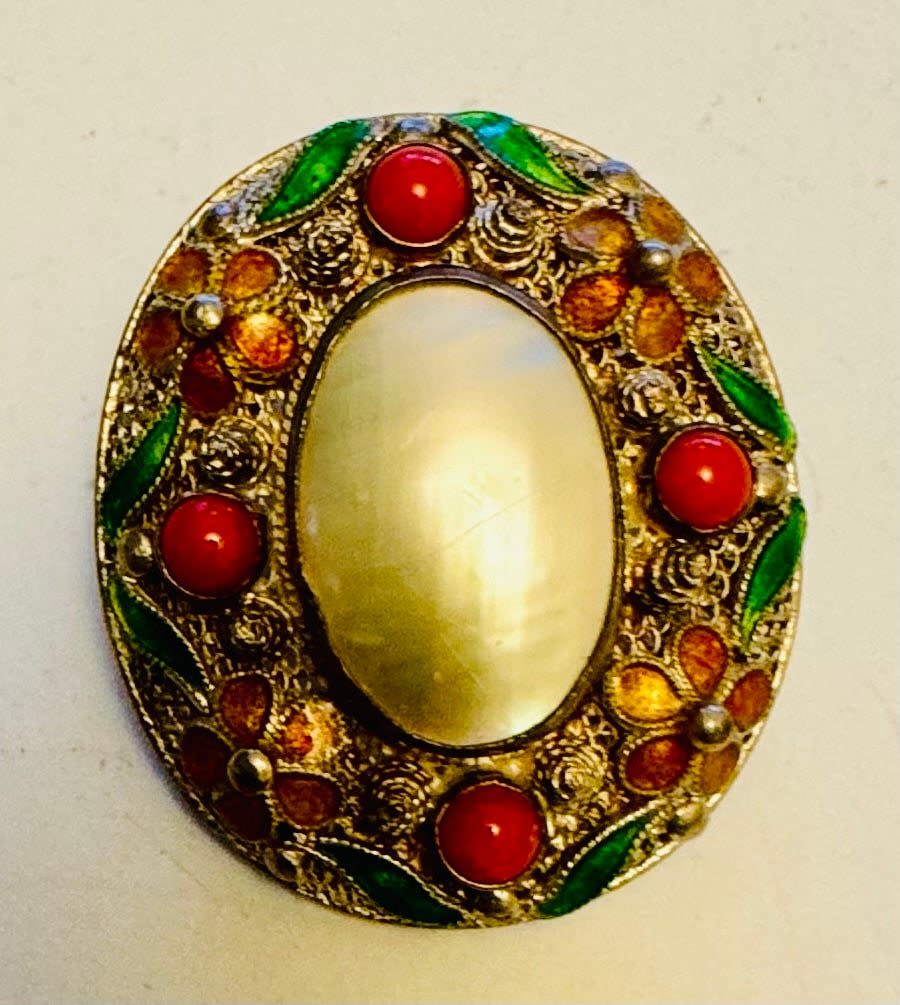 Lot 297: Enamel sterling blister pearl filigree pin