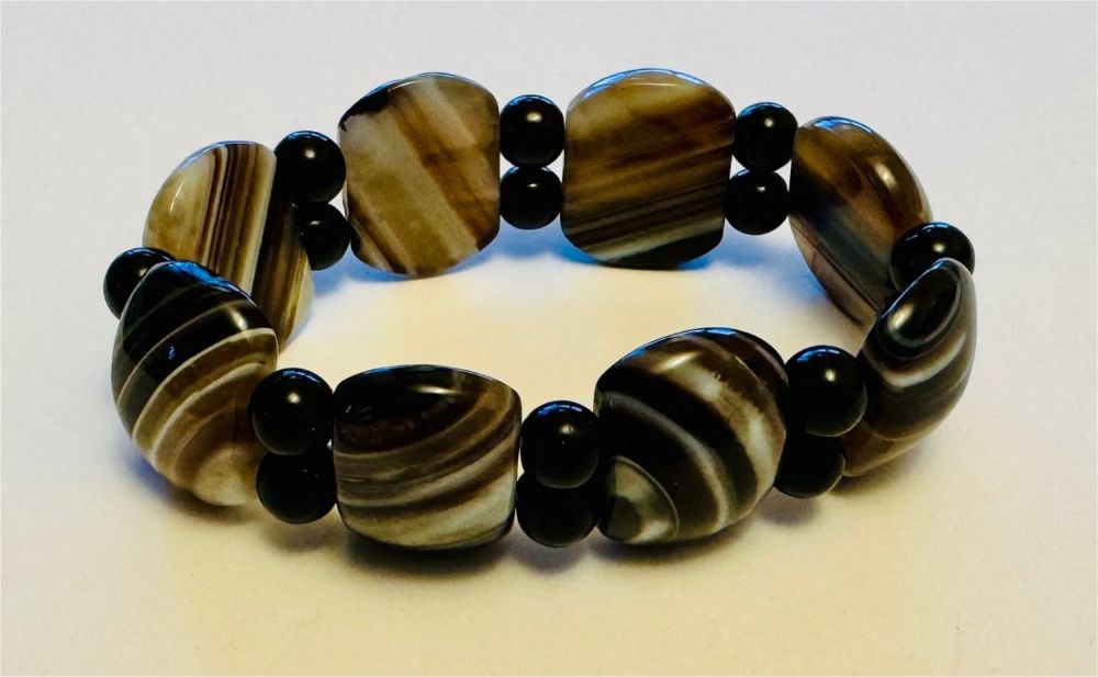 Lot 304: Evil eye banded agate polished bracelet