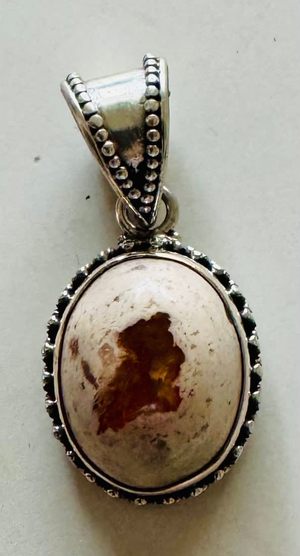 Lot 232: Opal sunstone sterling pendant