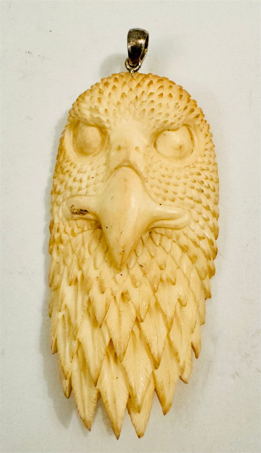 Lot 185: Eagle bone carved pendant