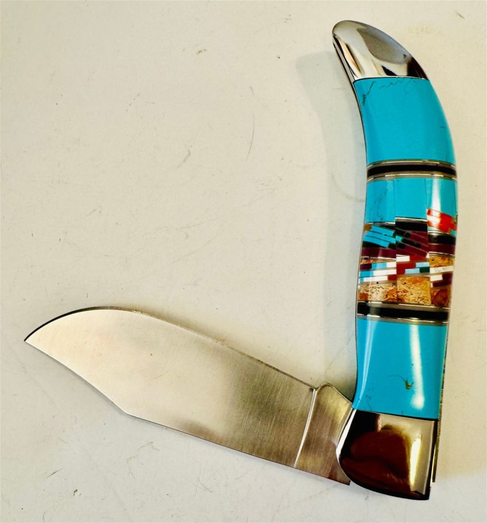 Lot 207: Turquoise inlaid American Indian design knife/case