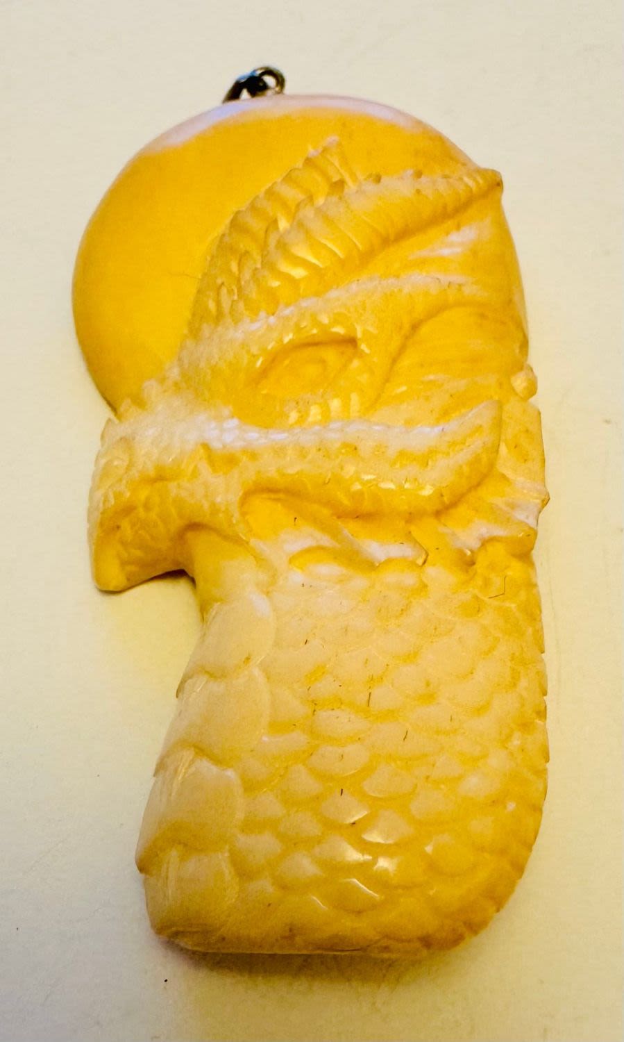 Lot 215: Bone carved pendant nice detail