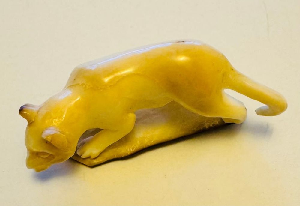Lot 218: Carved cat bone full body